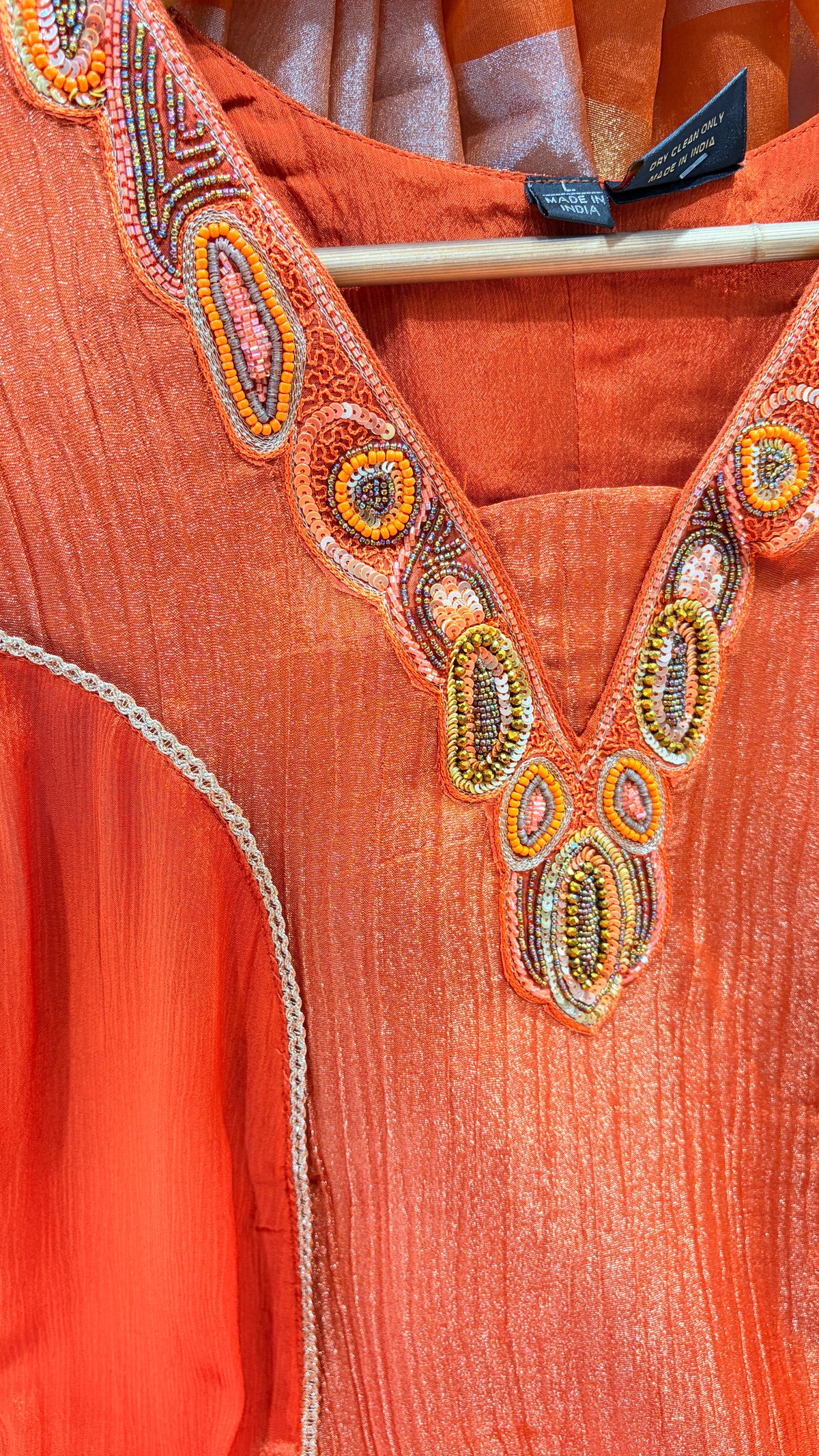 Orange shimmer suit