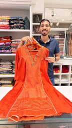 Orange shimmer suit